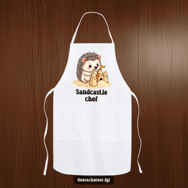Funny Hedgehog Apron: A playful hedgehog building a miniature sandcastle with precise detail, bringing humorous beach vibes to the kitchen.