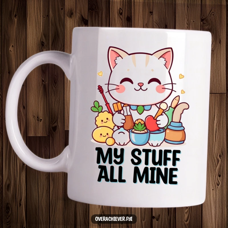 Funny Mug: A cute cat with a proud smirk shows off a perfectly arranged collection of objects, ideal for feline lovers.