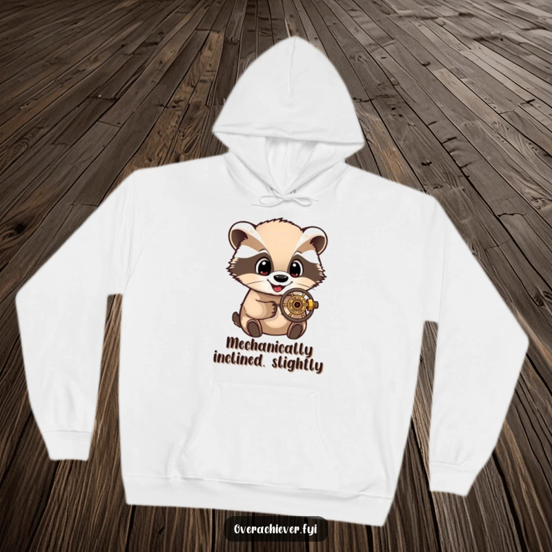 Funny Hoodie: A delighted badger character, eyes wide with wonder, closely inspecting a very small, finely detailed mechanism.