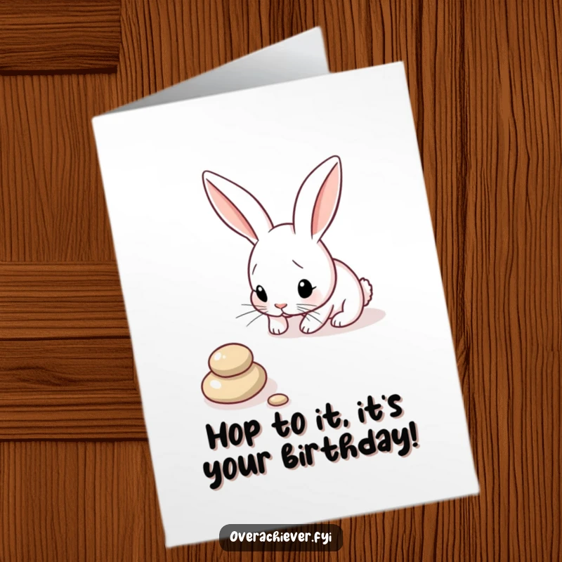 Funny Free Printable Birthday Card: A focused bunny arranging pebbles in a straight line, celebrating with precision and adorable charm.