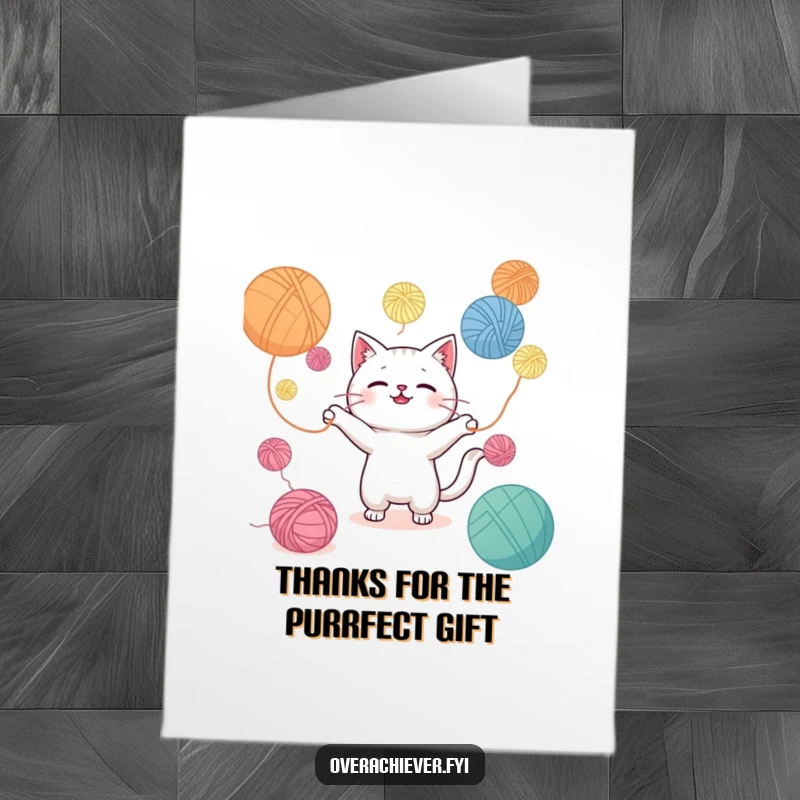 Funny Free Printable Thank You Card: Cute Kawaii cat joyfully juggling a cascade of yarn balls, expressing gratitude playfully.