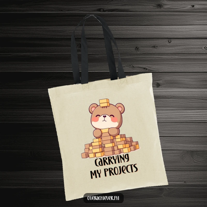 Funny tote bag featuring a focused bear gleefully stacking tiny blocks, a practical and humorous accessory.