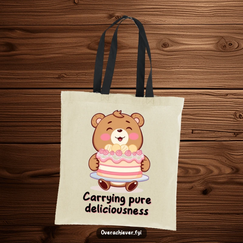 Funny bear baker tote bag featuring a beaming bear proudly showcasing a large, perfectly decorated cake.