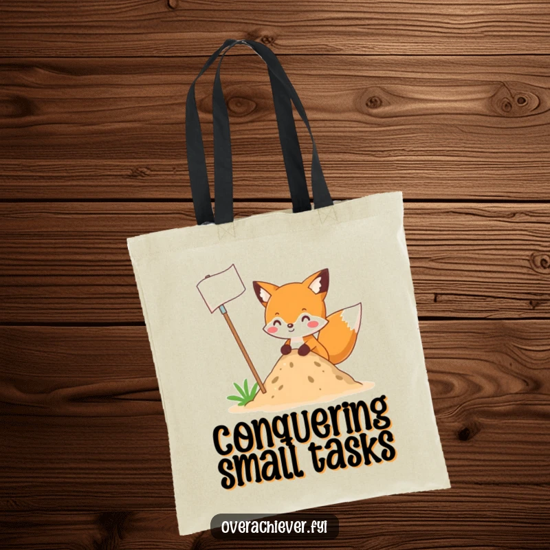 Funny fox character planting a large flag in a small dirt pile, illustrated on a durable tote bag, a funny and practical gift.