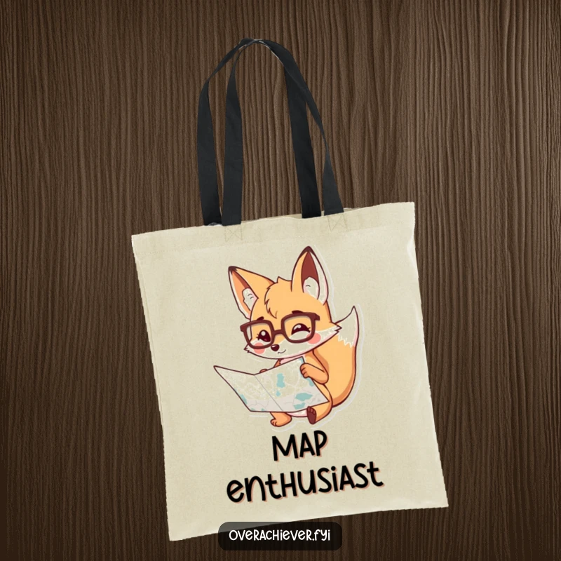 Funny Tote Bag: A playful fox wearing reading glasses, intently studying a detailed map, perfect for carrying essentials with humor.